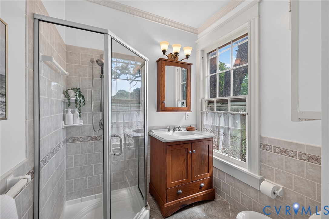 210 Henry Clay Road Ashland, VA 23005 - Photo 39 of 59 Glass-enclosed shower with tiled walls and a decor