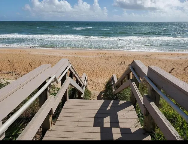 a view of a ocean from a balcony