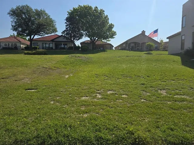 a view of a large garden with an outdoor space
