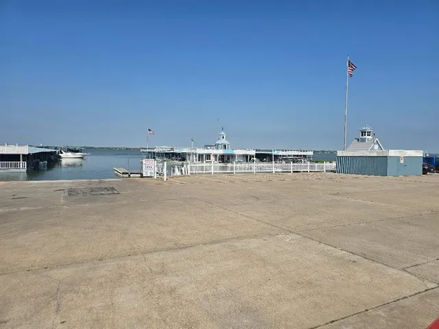 a view of water heater and cabinets