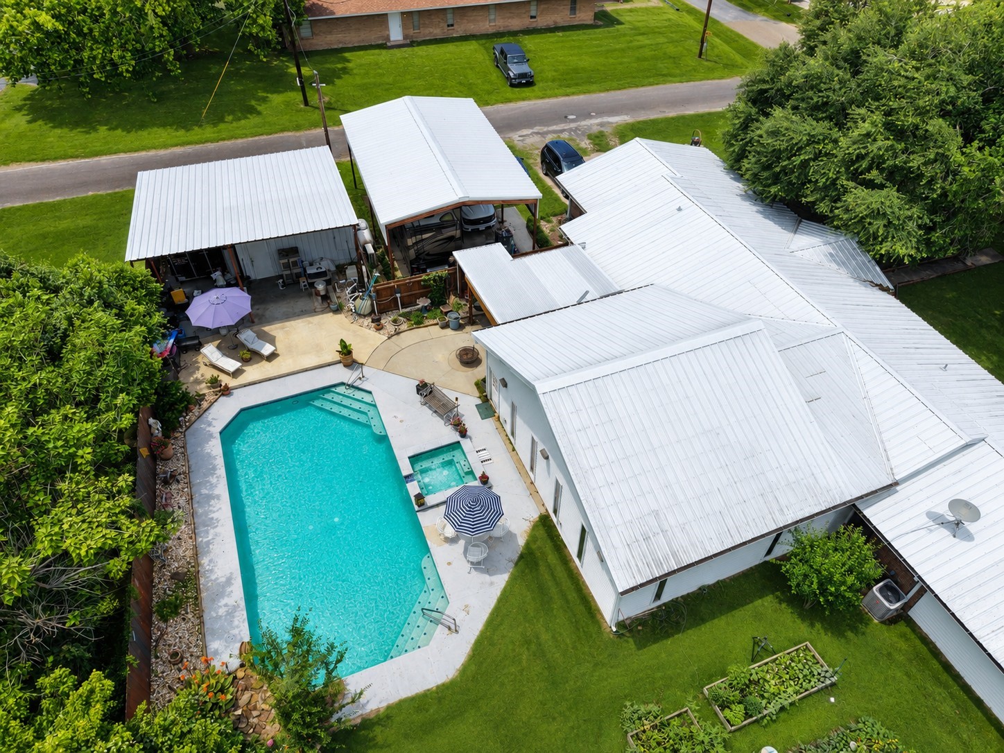 416 Division Street Jewett, TX 75846 - Photo 30 of 38 an aerial view of a house with a yard