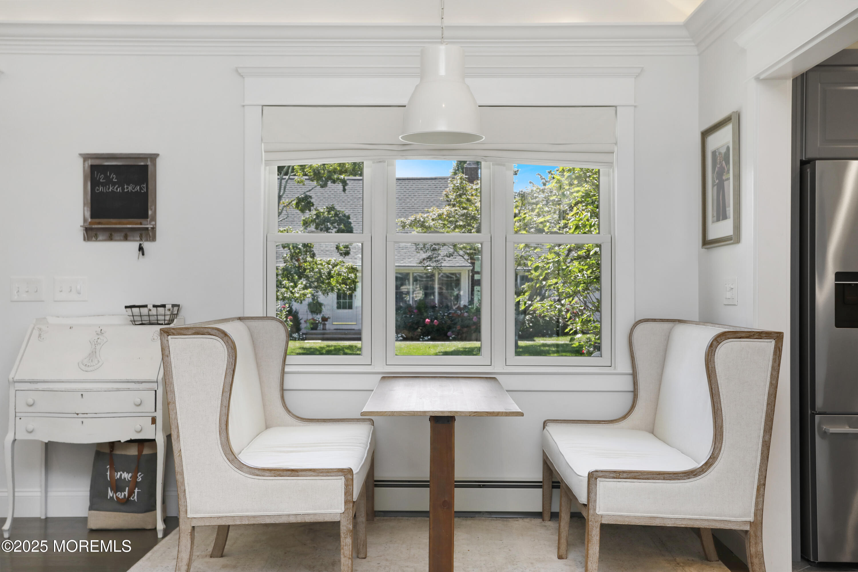 1706 Forest Street Wall, NJ 07719 - Photo 15 of 61 a porch with a chair and a large window