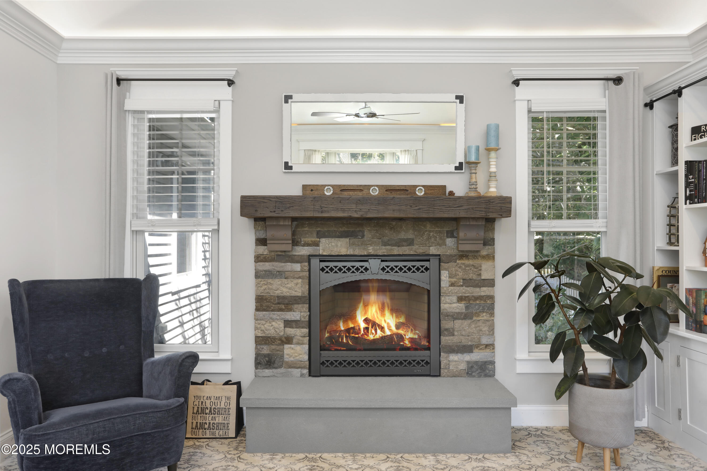1706 Forest Street Wall, NJ 07719 - Photo 25 of 61 a living room with furniture and a fireplace