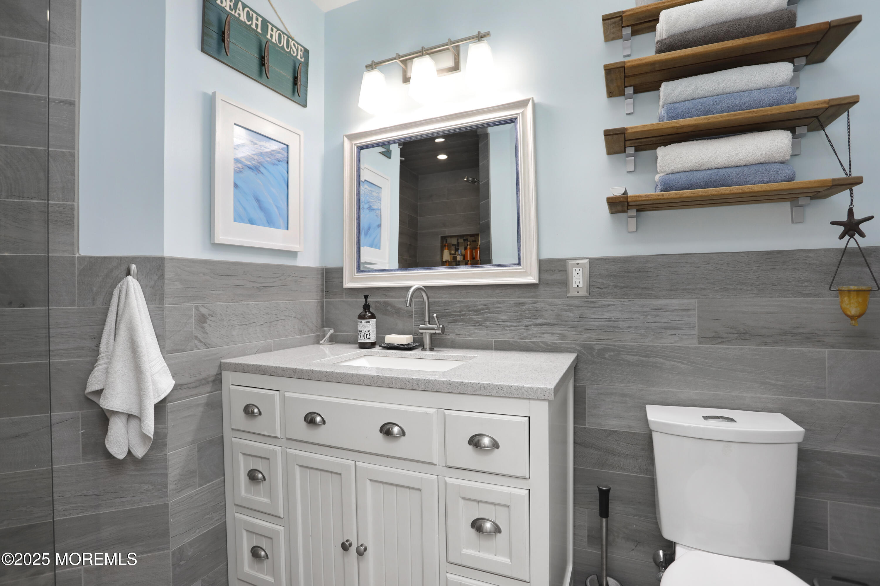 1706 Forest Street Wall, NJ 07719 - Photo 31 of 61 a bathroom with a sink toilet and mirror