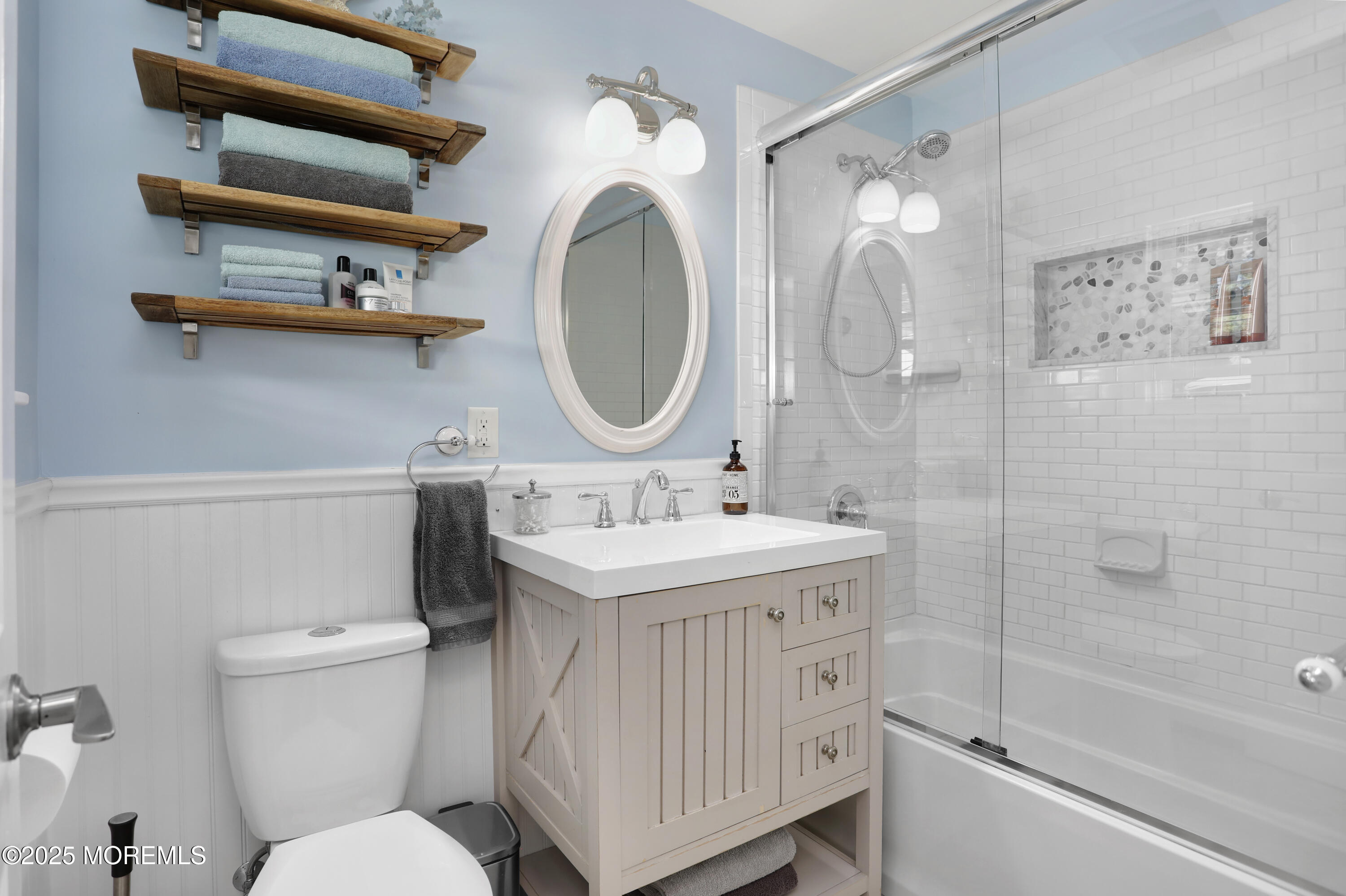 1706 Forest Street Wall, NJ 07719 - Photo 37 of 61 a bathroom with a sink a toilet and a mirror