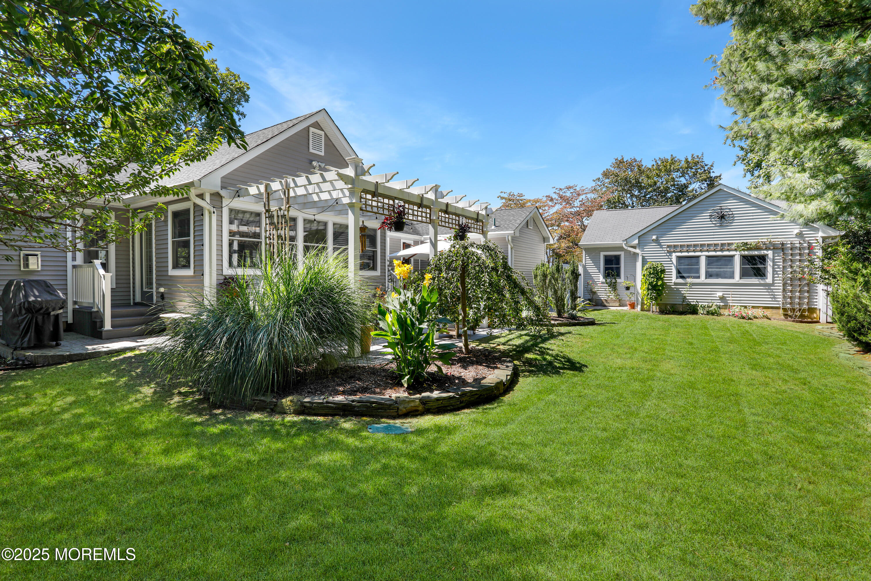 1706 Forest Street Wall, NJ 07719 - Photo 42 of 61 a front view of a house with a yard