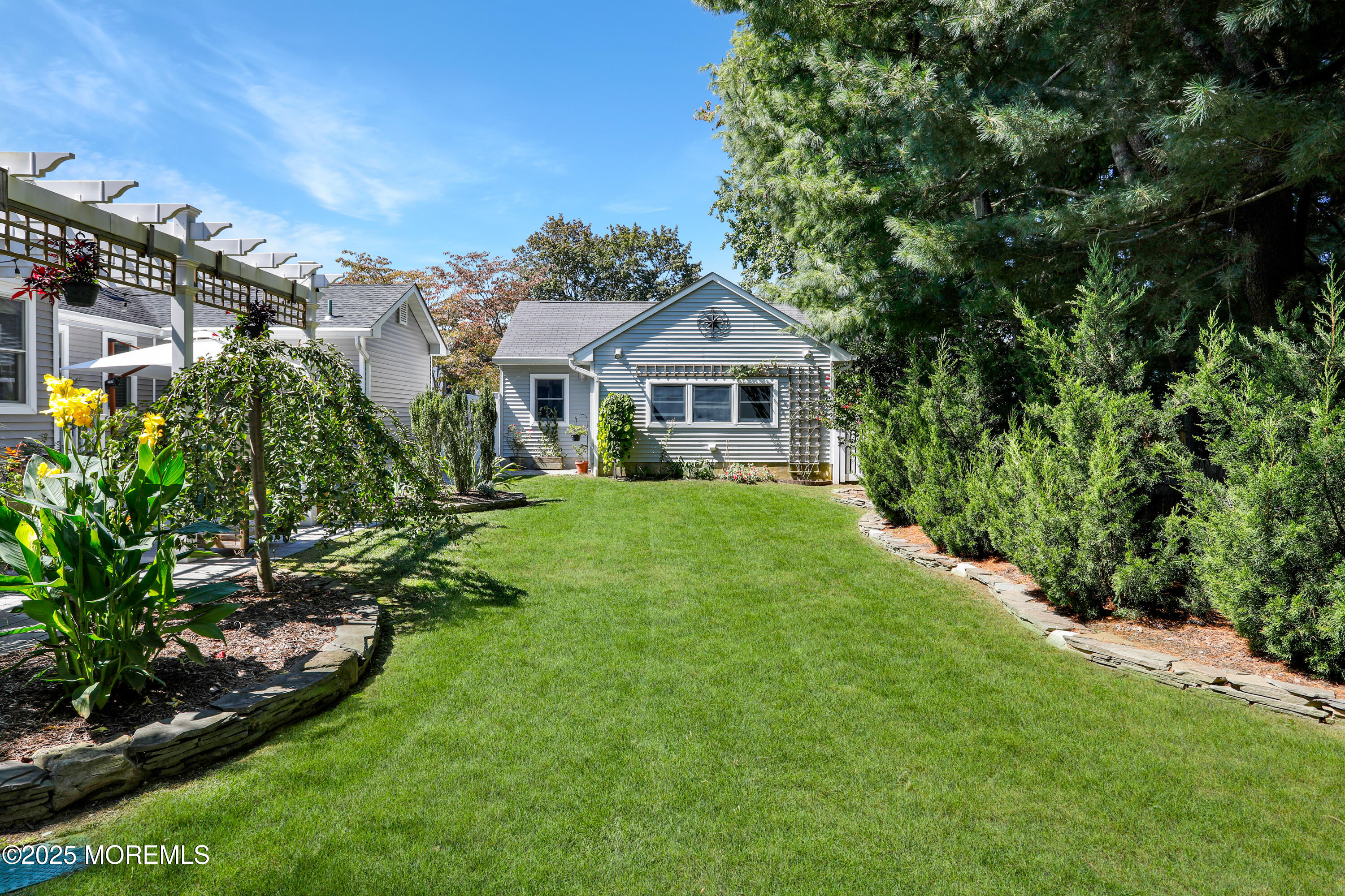 1706 Forest Street Wall, NJ 07719 - Photo 45 of 61 a front view of a house with a yard