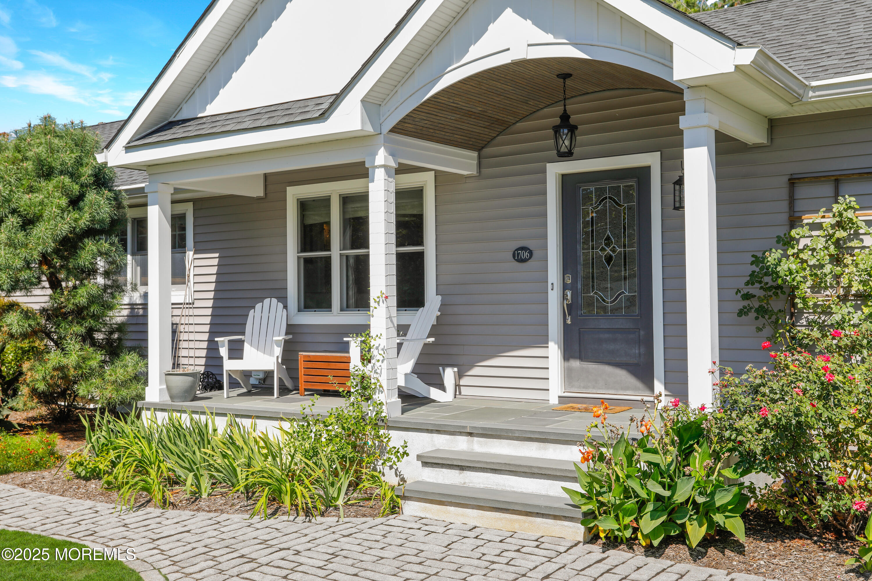 1706 Forest Street Wall, NJ 07719 - Photo 5 of 61 a front view of a house with a garden