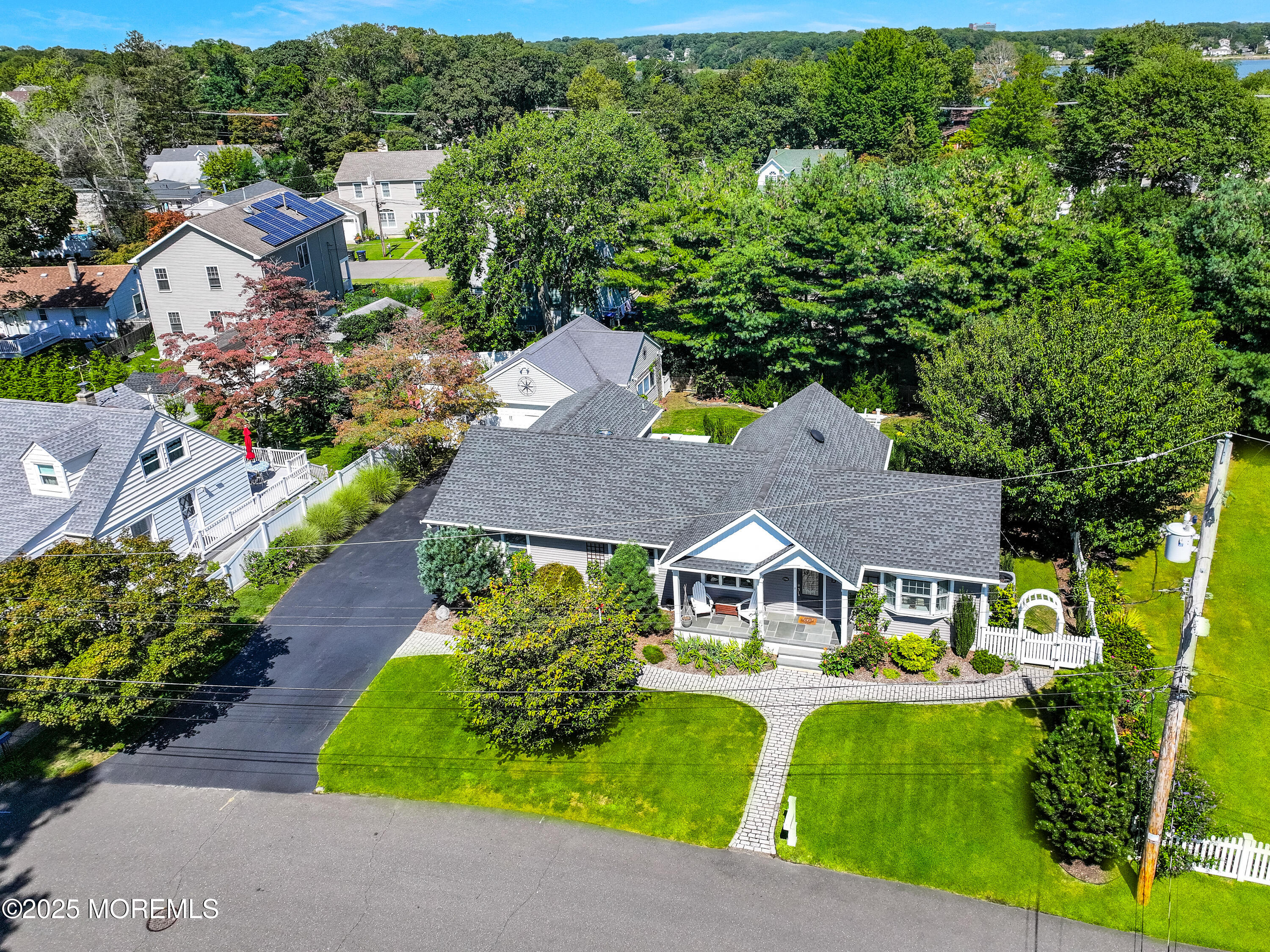 1706 Forest Street Wall, NJ 07719 - Photo 53 of 61 an aerial view of a house with a garden and swimming pool