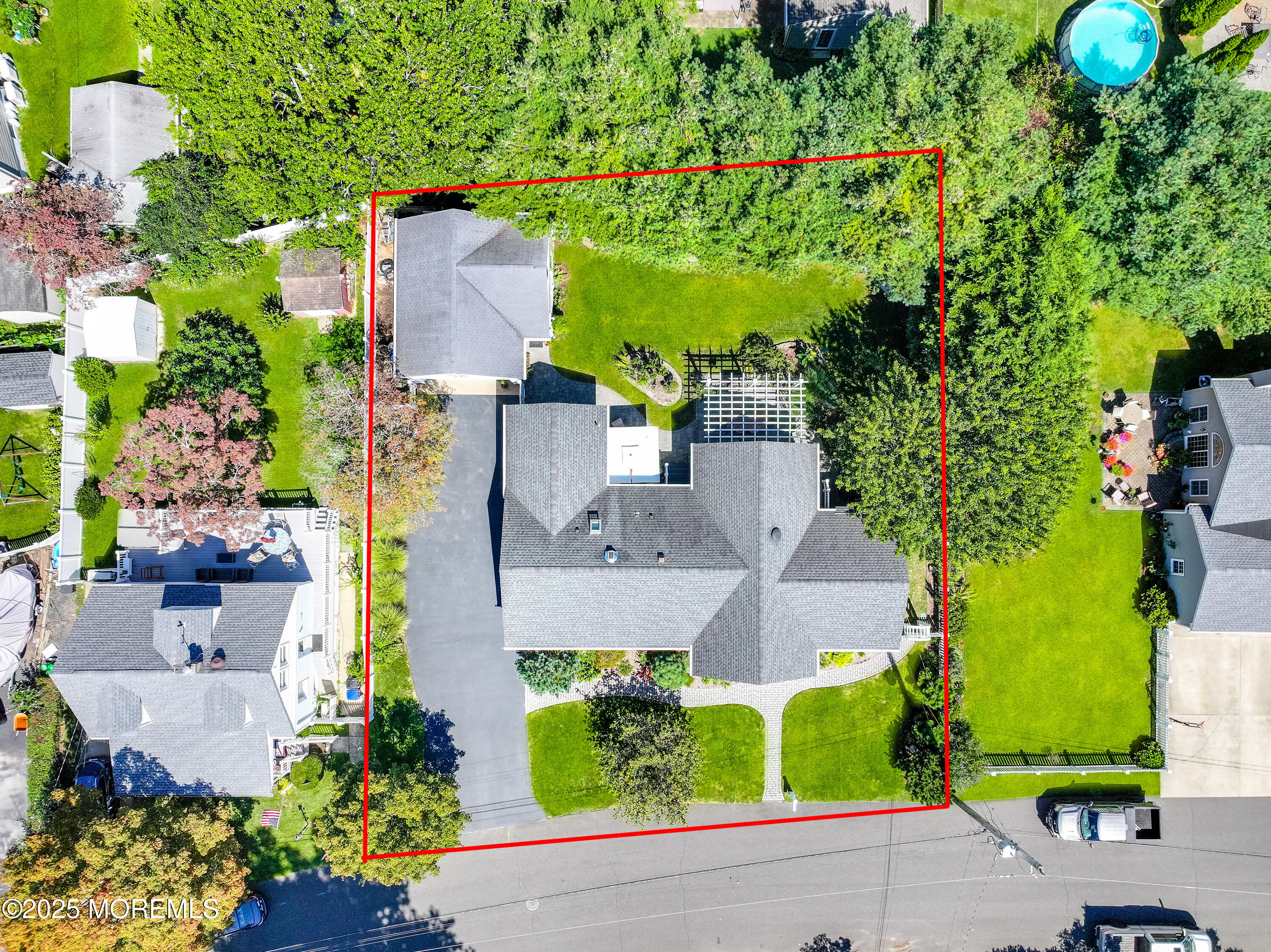 1706 Forest Street Wall, NJ 07719 - Photo 57 of 61 an aerial view of a house with a yard and garden