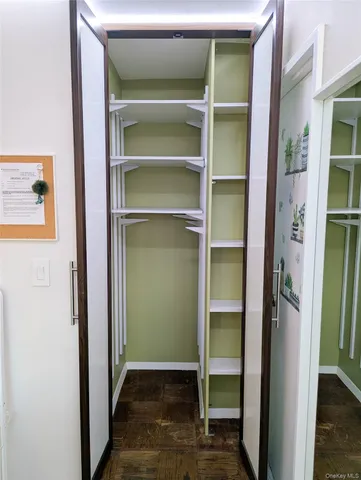 a view of a hallway with closet