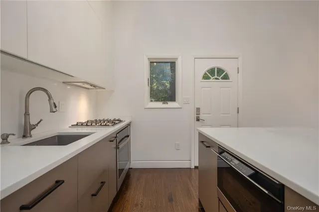 a view of a windows and chandelier in a room