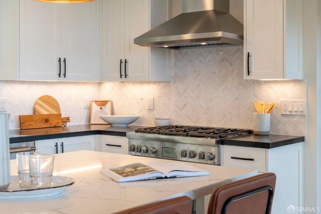 a bedroom with a bed and a table