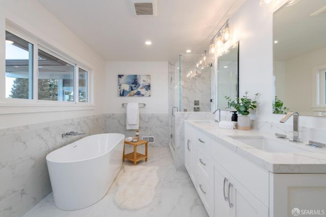 a outdoor space with patio the couches and a potted plant on the table