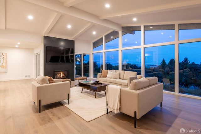 a house view with a garden space