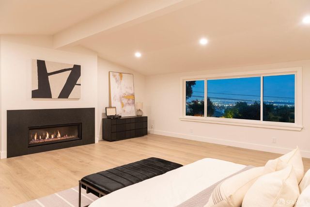 an aerial view of a house with a garden