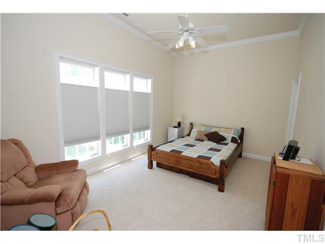 5308 Tallowtree Drive Raleigh, NC 27613 - Photo 20 of 25 Downstairs bedroom has interior access to full bath and large walk in closet making it a great guest suite Bedroom
