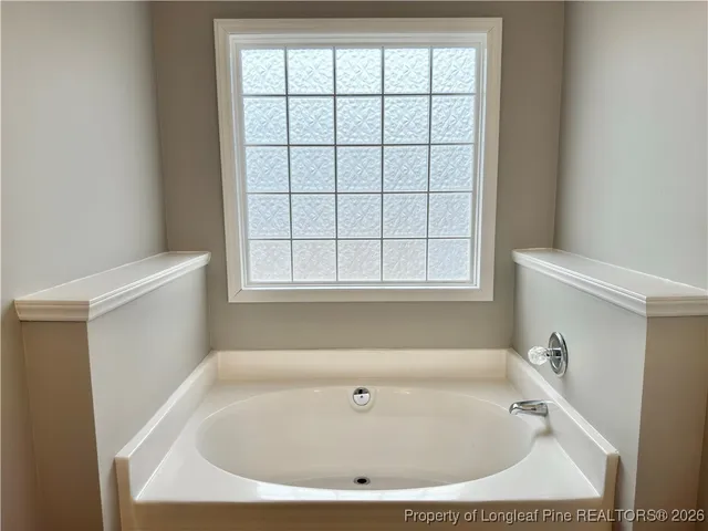 a bathroom with a bathtub