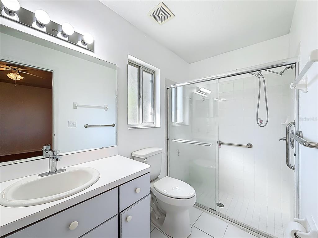 6175 Southwest 98th Loop Ocala, FL 34476 - Photo 33 of 56 a bathroom with a sink toilet and shower
