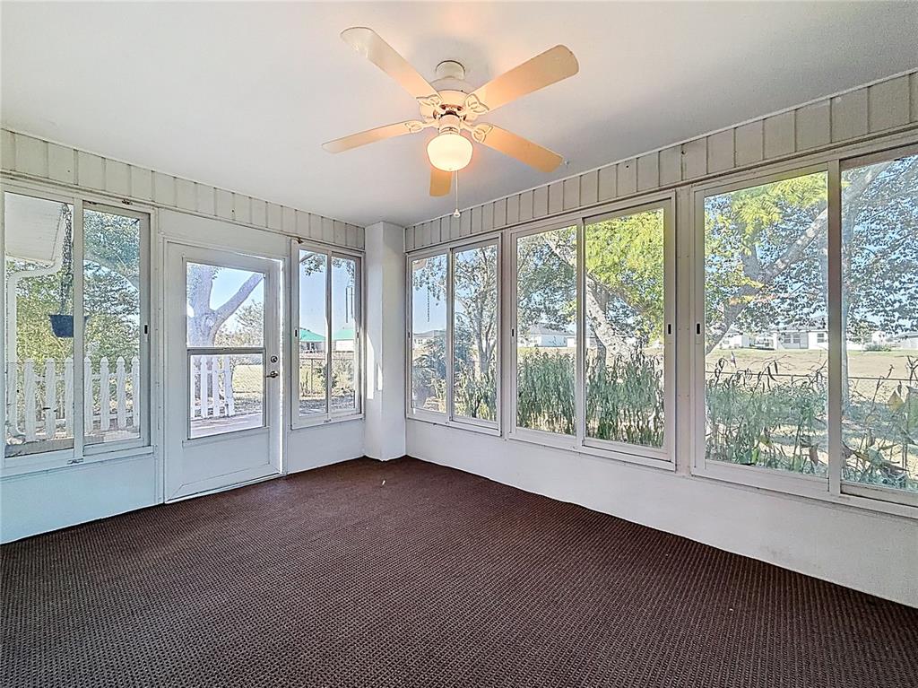 6175 Southwest 98th Loop Ocala, FL 34476 - Photo 35 of 56 a view of an empty room with a large window