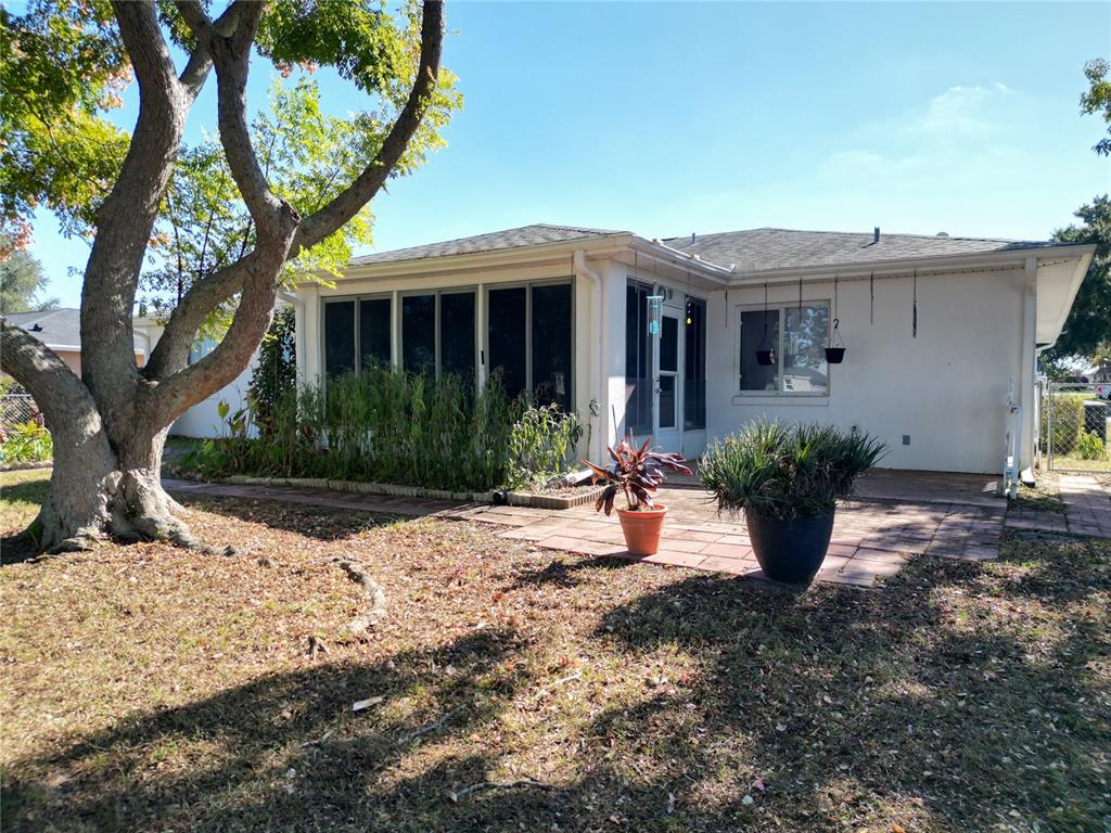 6175 Southwest 98th Loop Ocala, FL 34476 - Photo 38 of 56 a view of a house with yard and plants