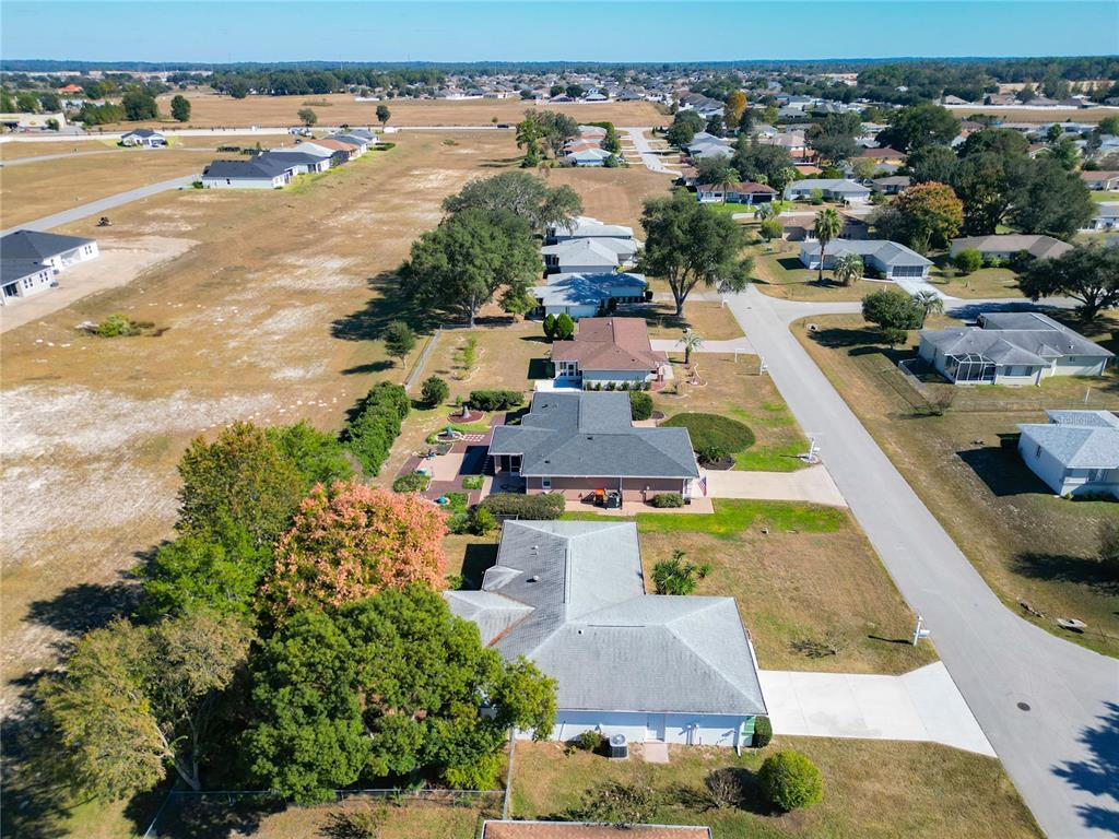 6175 Southwest 98th Loop Ocala, FL 34476 - Photo 55 of 56 an aerial view of residential houses with outdoor space