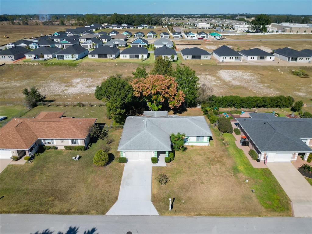 6175 Southwest 98th Loop Ocala, FL 34476 - Photo 56 of 56 an aerial view of residential houses with outdoor space