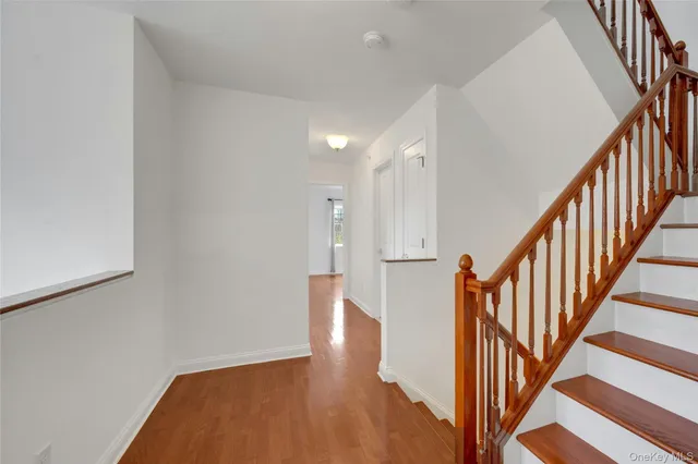 a view of entryway with wooden floor