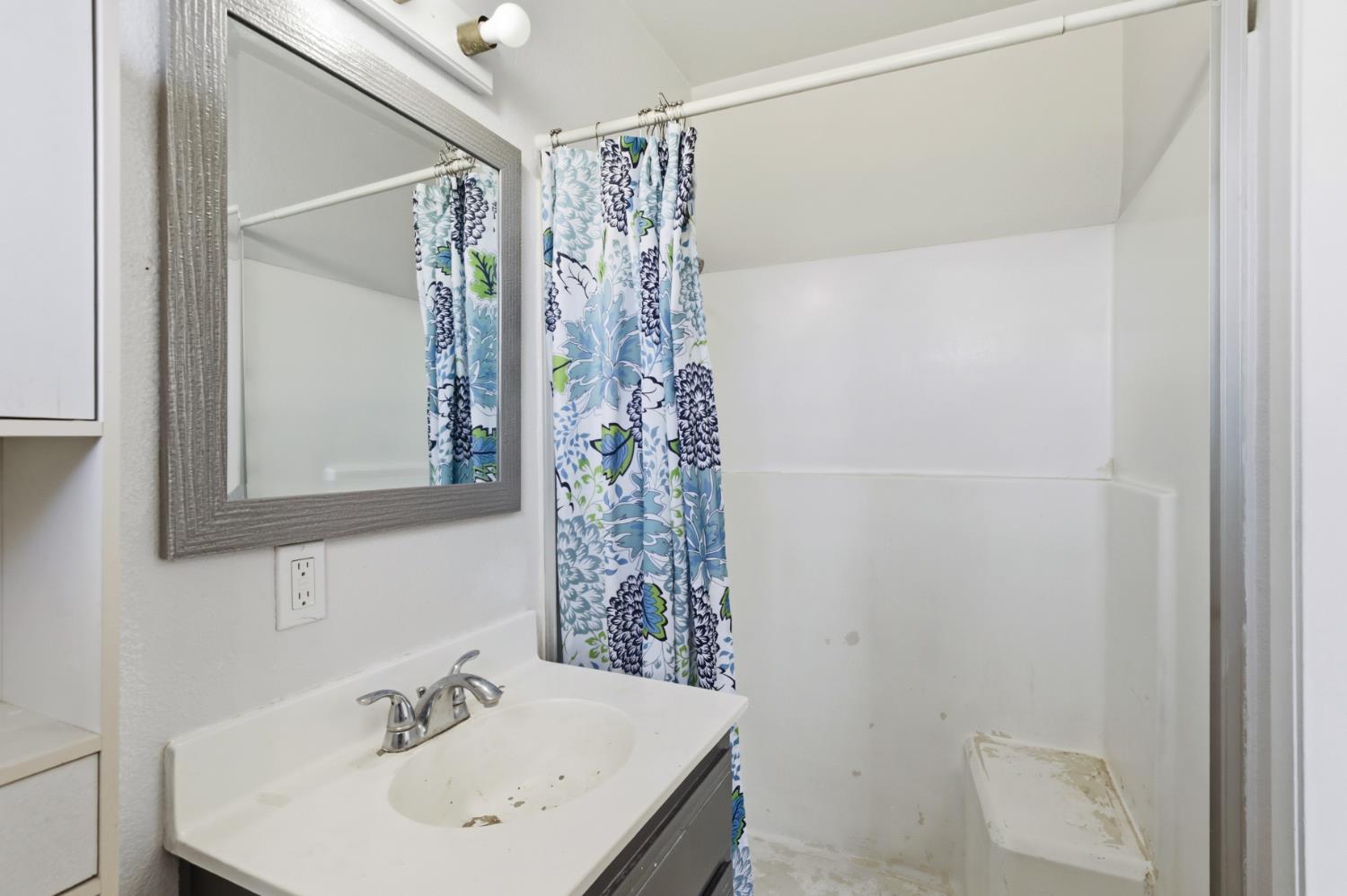 7208 7th Street Rio Linda, CA 95673 - Photo 17 of 41 a bathroom with a sink and shower