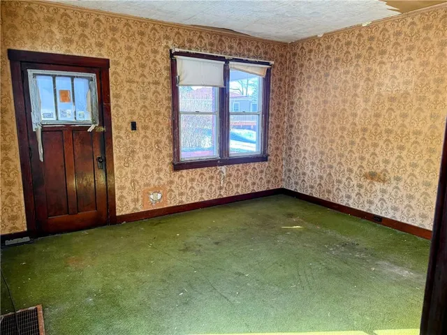 en empty room with windows