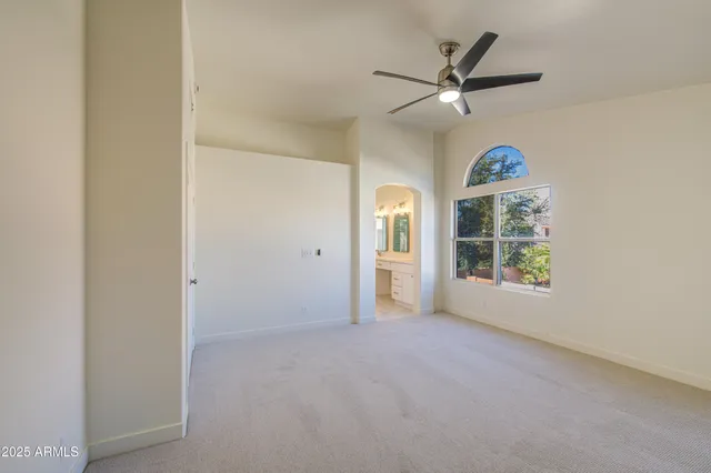 a view of a hallway with closet area