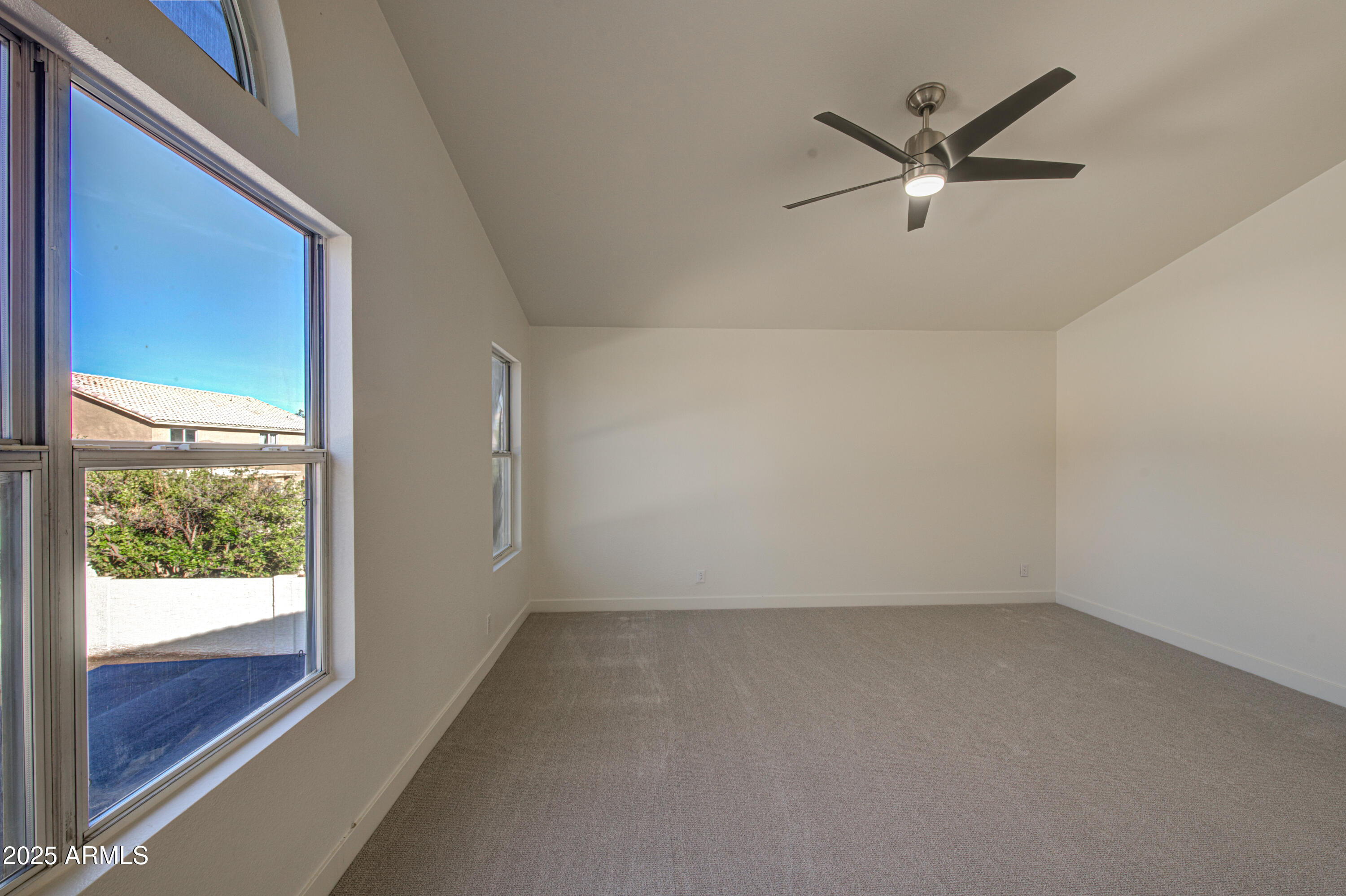 4266 East Millbrae Lane Gilbert, AZ 85234 - Photo 25 of 53 an empty room with a window