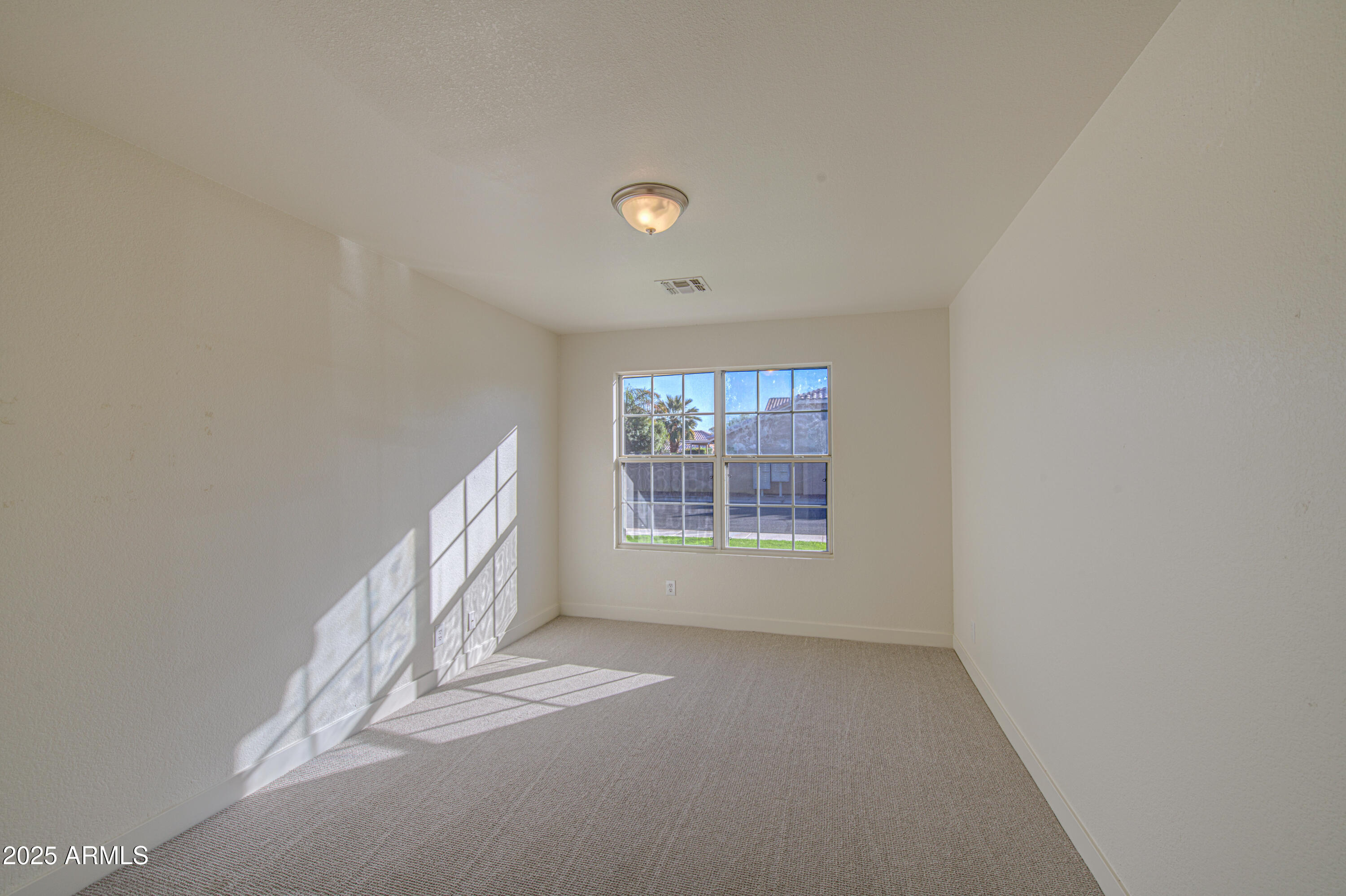 4266 East Millbrae Lane Gilbert, AZ 85234 - Photo 32 of 53 a view of a livingroom with a window