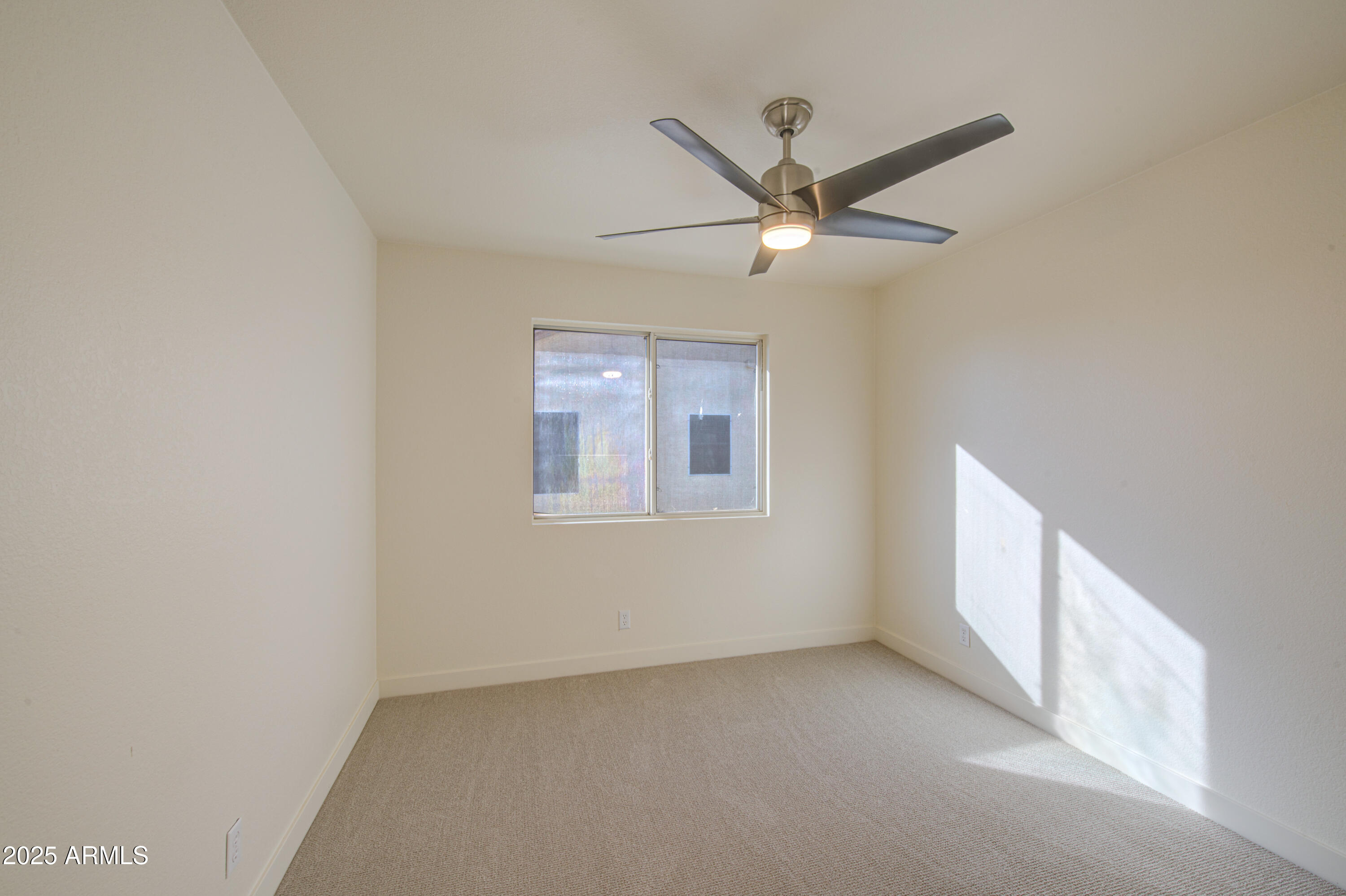 4266 East Millbrae Lane Gilbert, AZ 85234 - Photo 40 of 53 a view of an empty room with a window