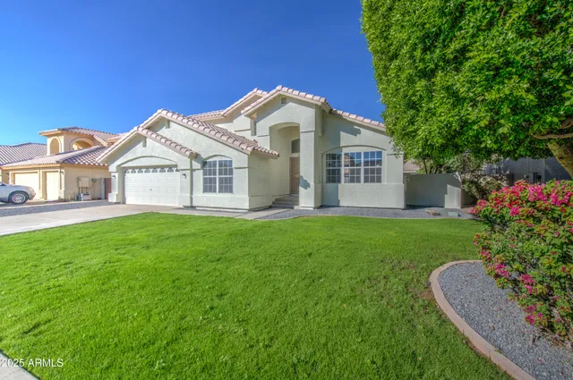 a view of a house with a garden