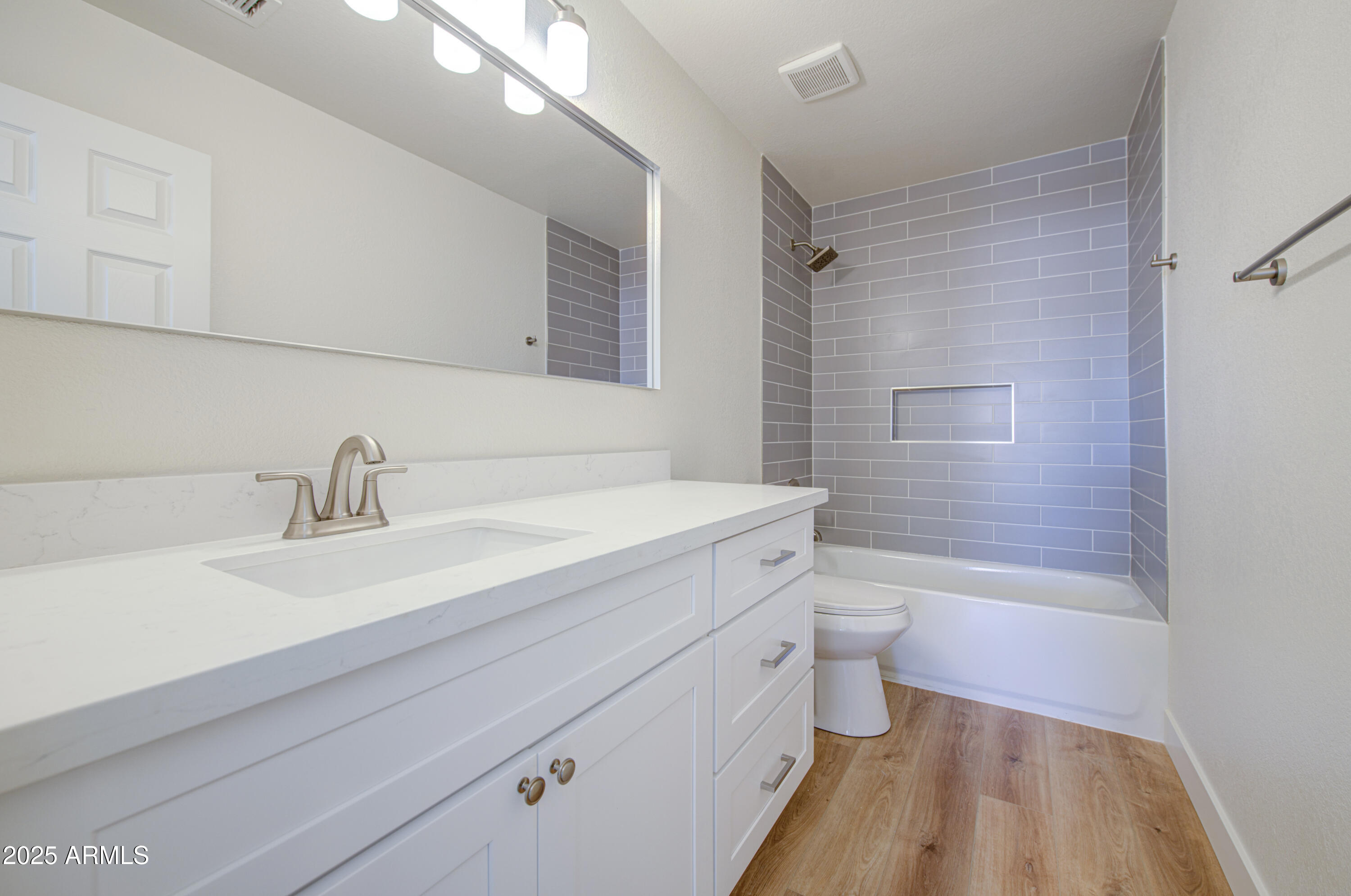 4266 East Millbrae Lane Gilbert, AZ 85234 - Photo 45 of 53 a bathroom with a sink a toilet and shower