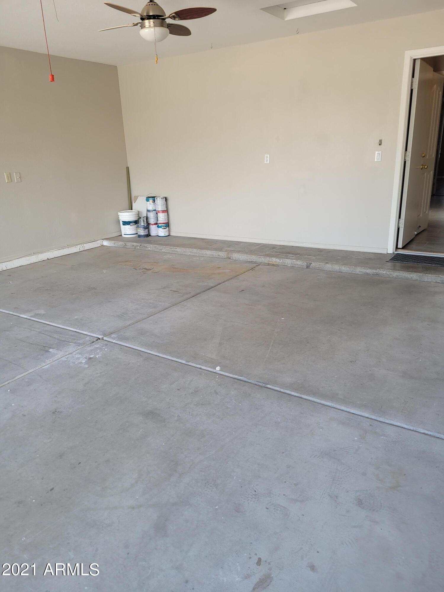 521 West St John Road Phoenix, AZ 85023 - Photo 17 of 17 2 car garage has ceiling fan