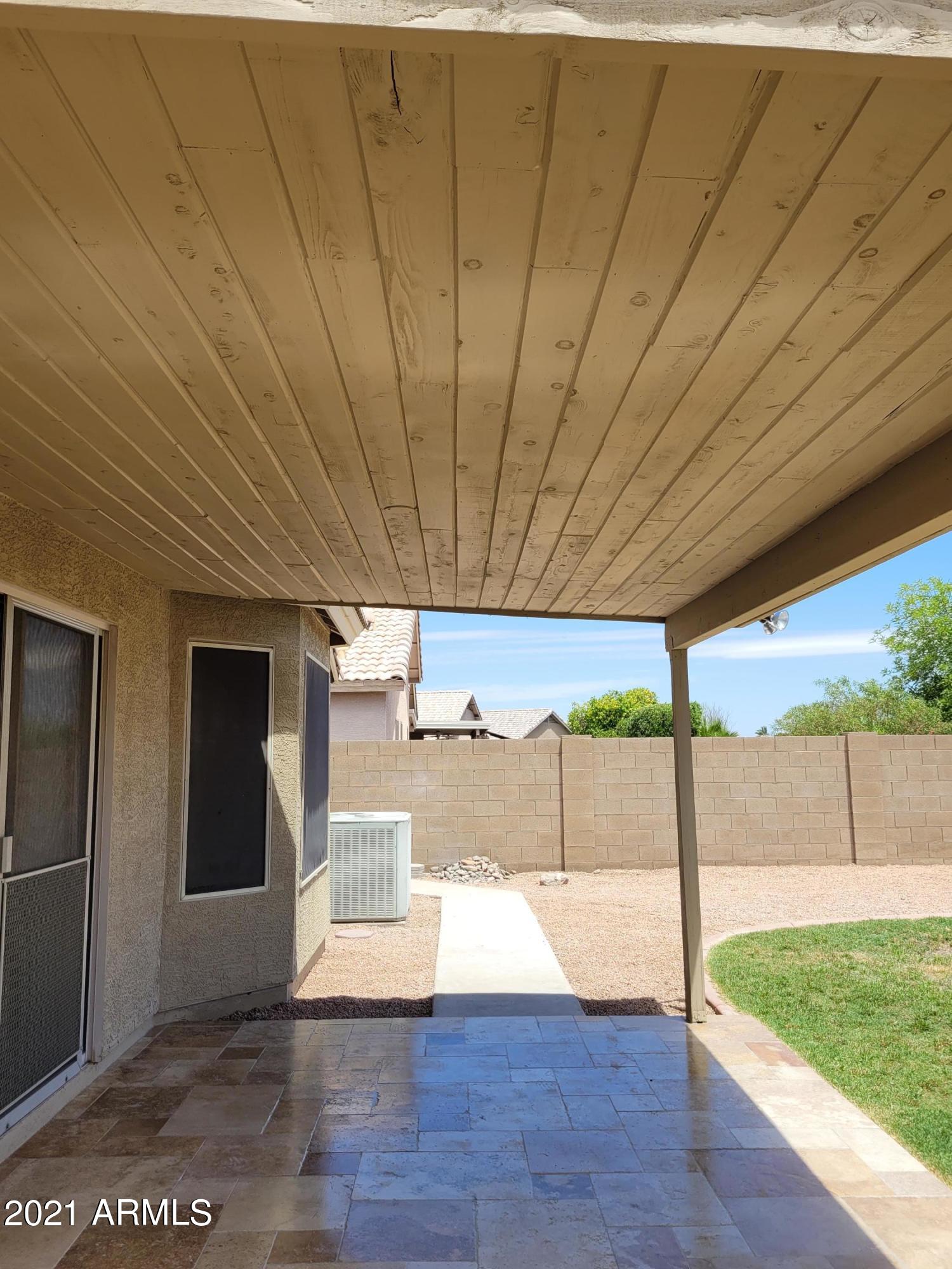 521 West St John Road Phoenix, AZ 85023 - Photo 9 of 17 Travertine patio floor