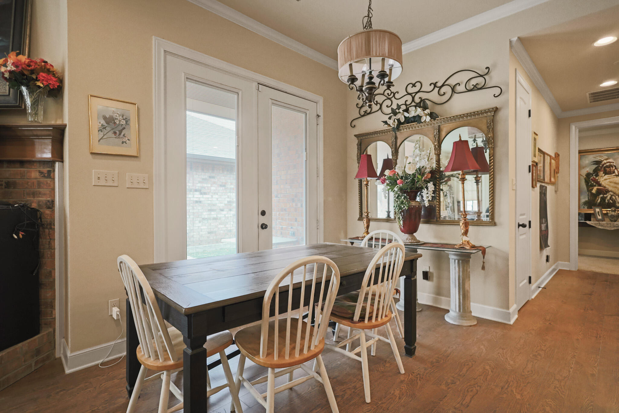 73 Windsor Court Lubbock, TX 79416 - Photo 15 of 34 a view of a dining room with furniture and chandelier