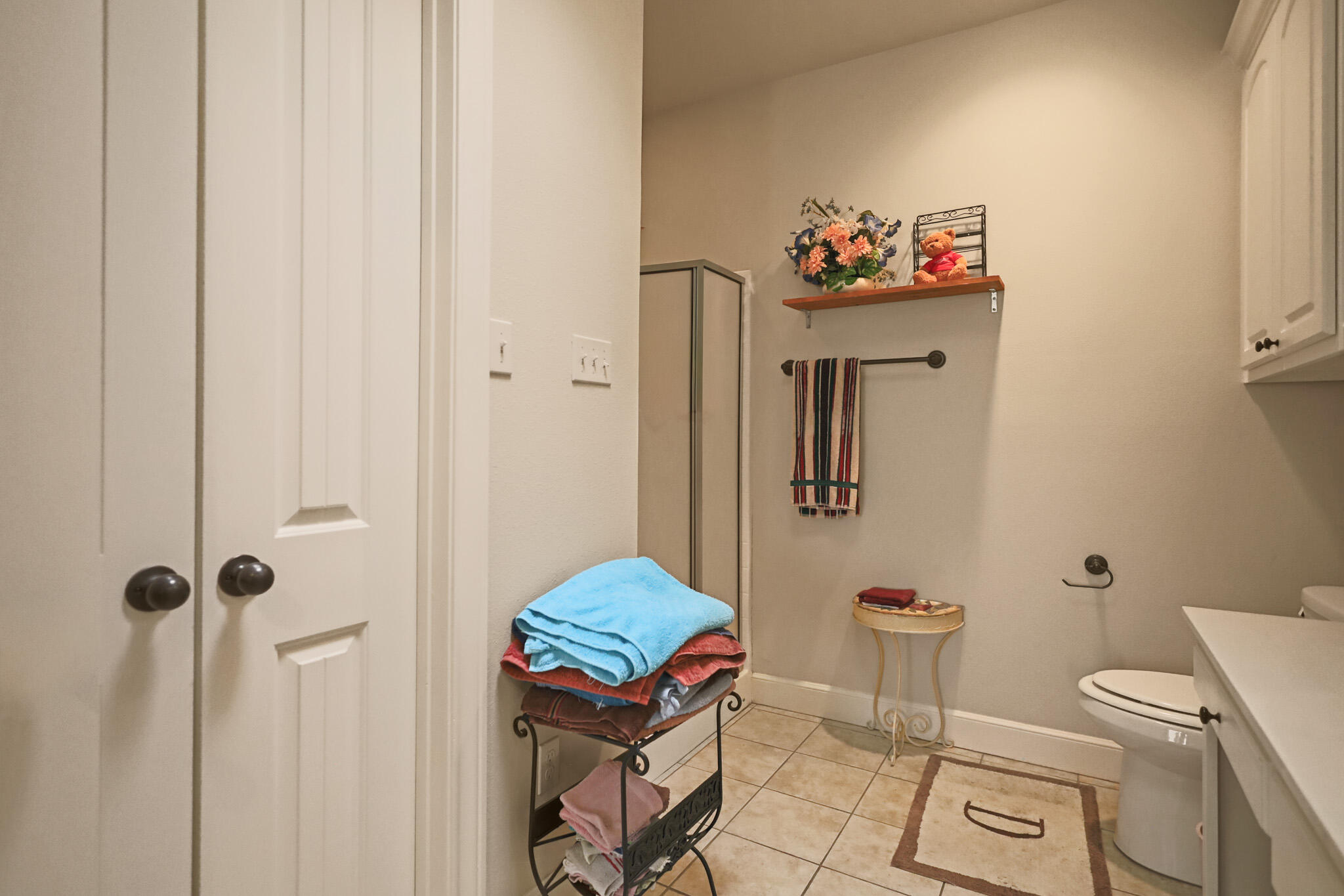 73 Windsor Court Lubbock, TX 79416 - Photo 24 of 34 a bathroom with a sink toilet and shower