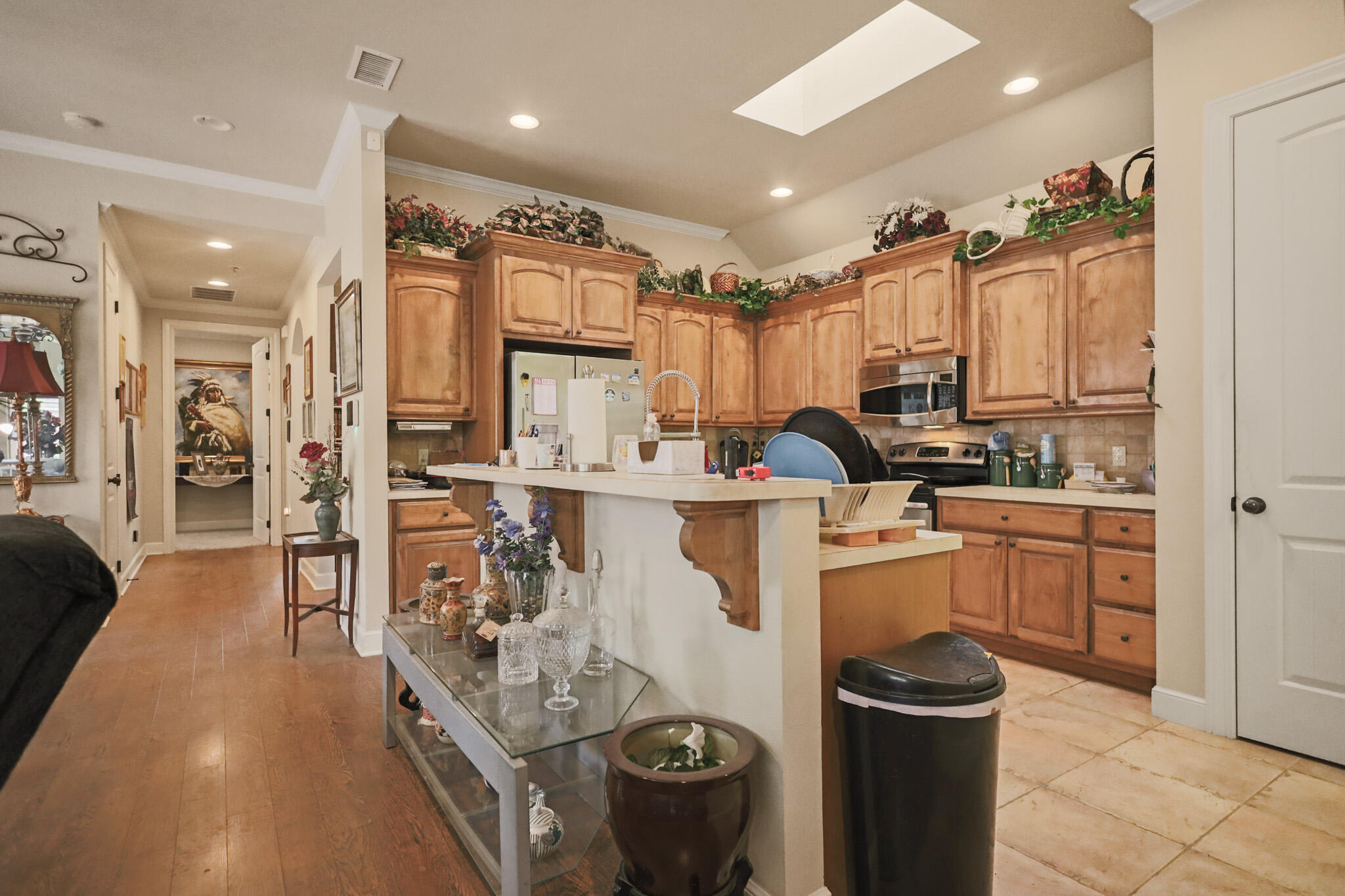 73 Windsor Court Lubbock, TX 79416 - Photo 8 of 34 a kitchen with a sink appliances and cabinets