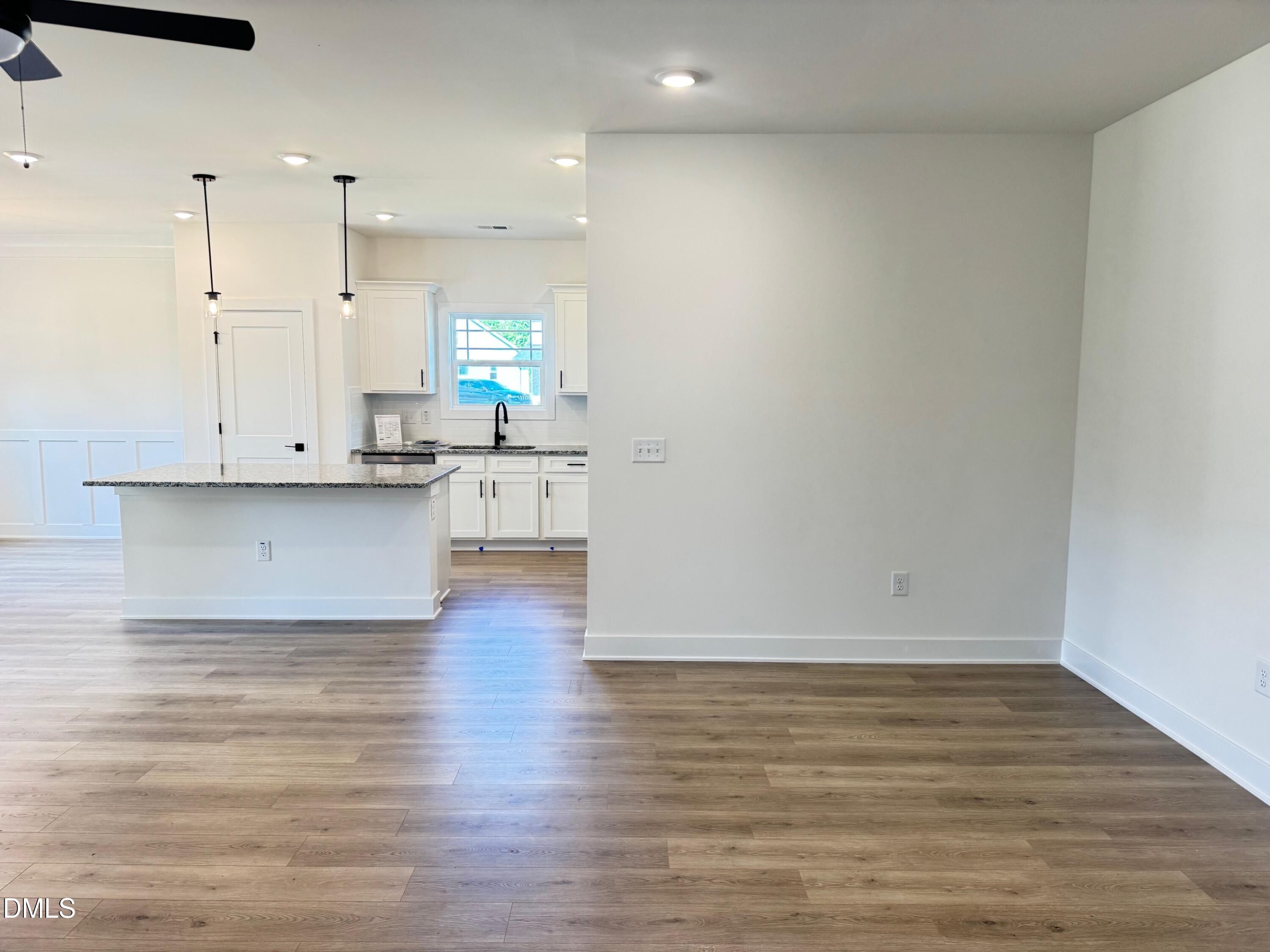 20 Streamline Court Lillington, NC 27546 - Photo 13 of 46 a view of a kitchen with wooden floor and a sink
