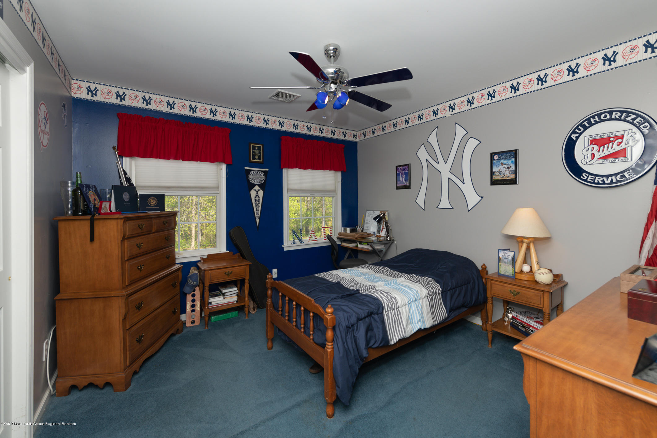 717 Fort Plains Road Howell, NJ 07731 - Photo 17 of 30 a bedroom with a bed and a chandelier