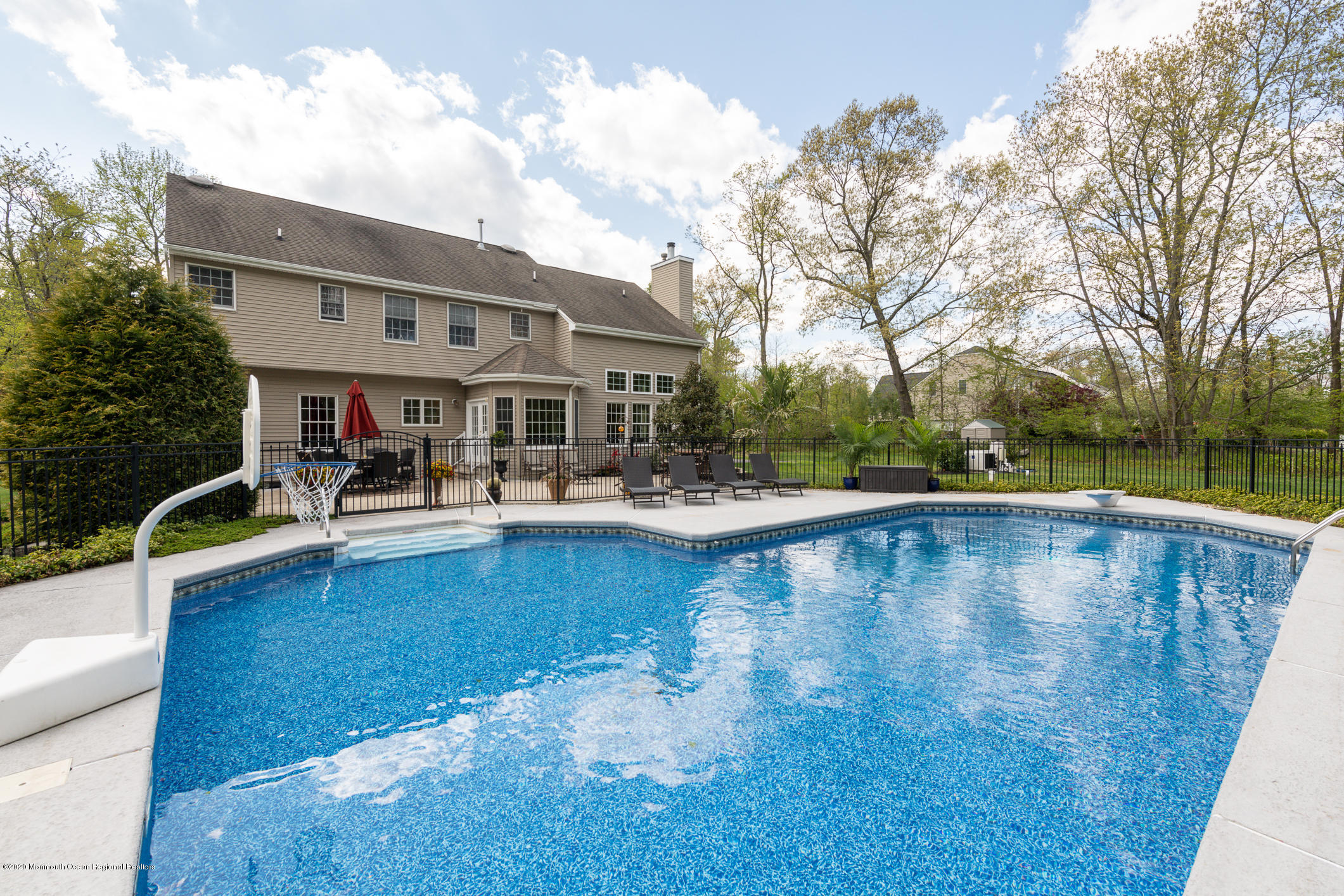 717 Fort Plains Road Howell, NJ 07731 - Photo 25 of 30 a view of a swimming pool with lounge chair