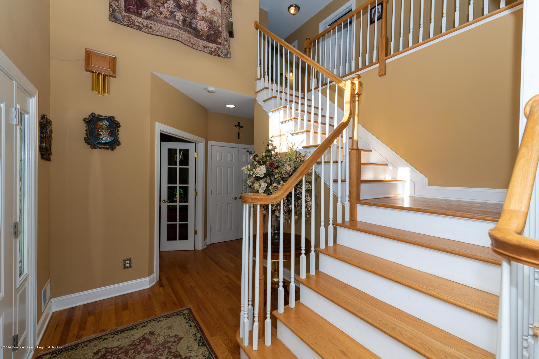 717 Fort Plains Road Howell, NJ 07731 - Photo 4 of 30 a view of entryway and hall with wooden floor