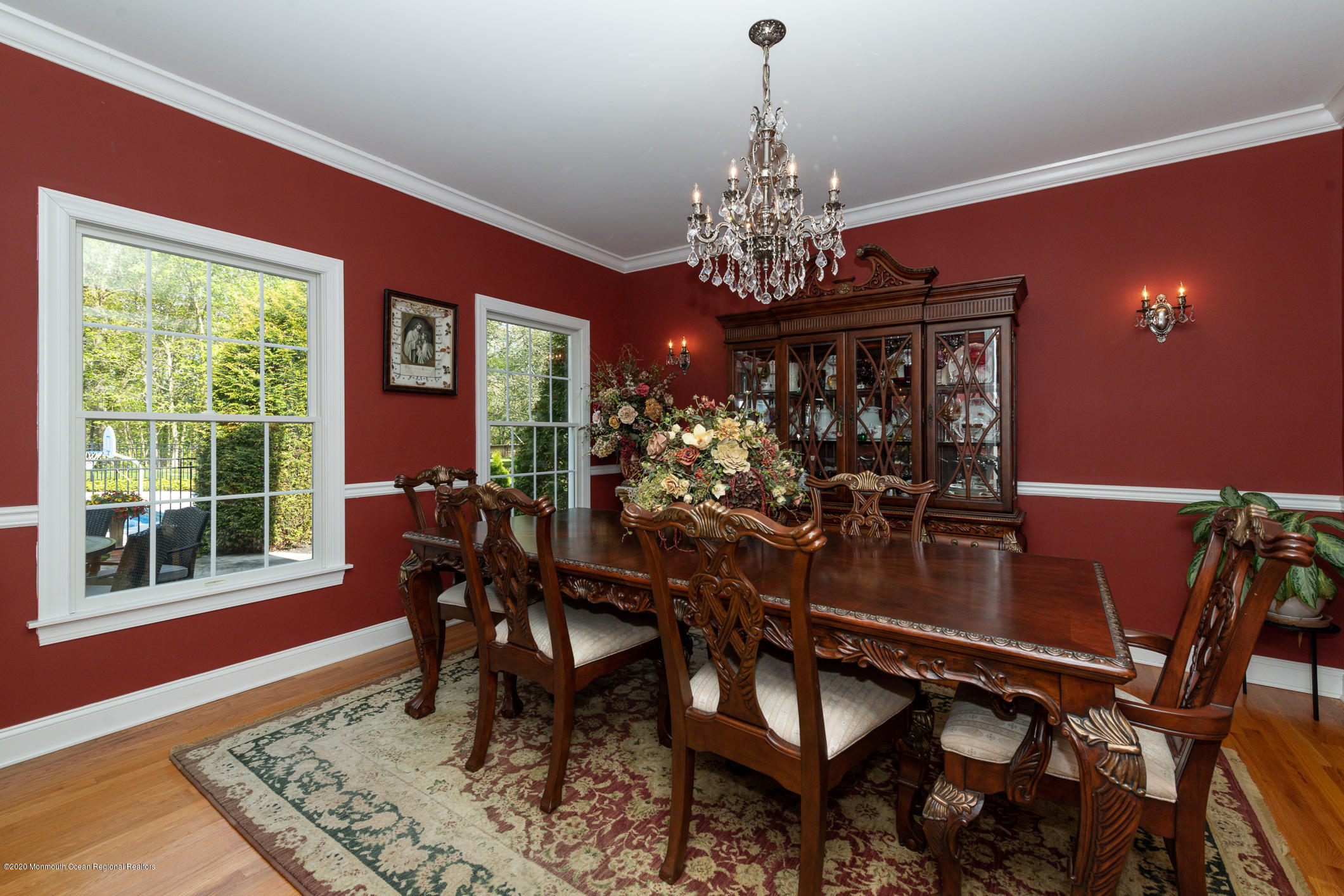 717 Fort Plains Road Howell, NJ 07731 - Photo 8 of 30 a view of a dining room with furniture a chandelier and wooden floor