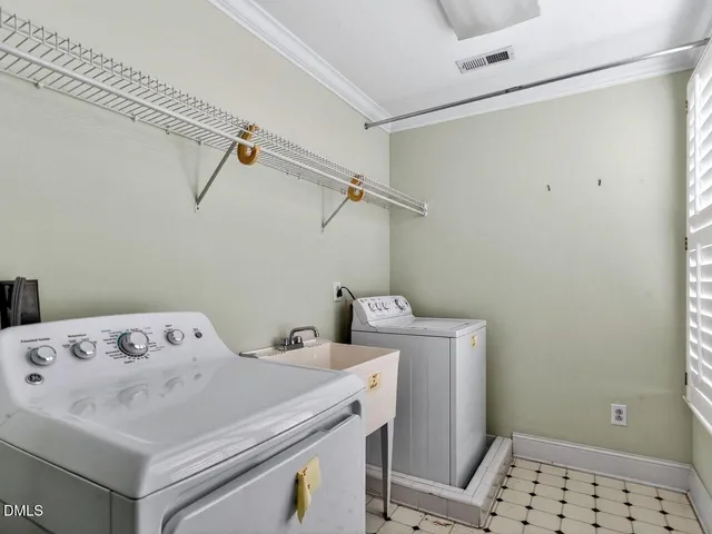 a bedroom with a bed and a window in it