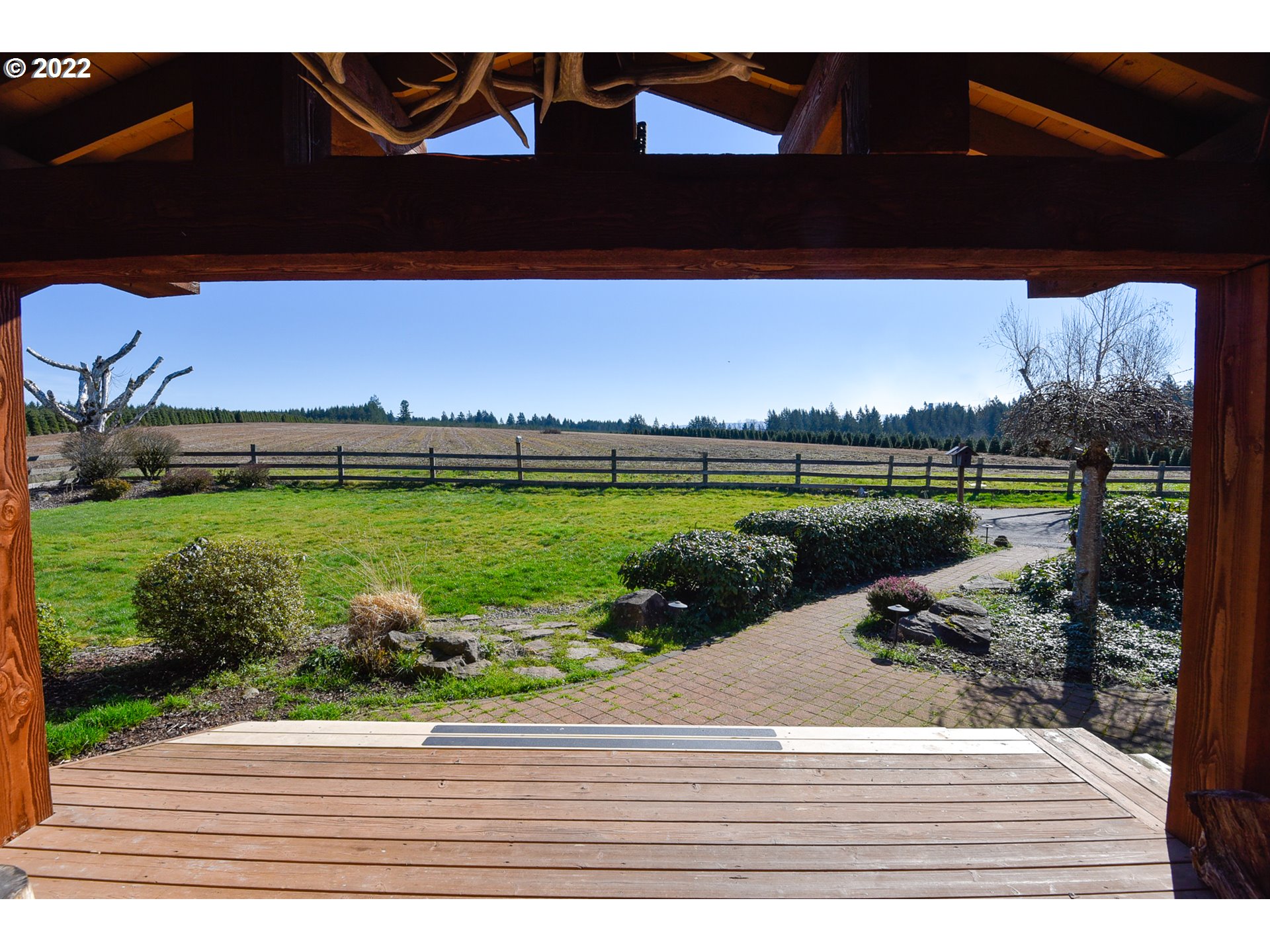 25861 South Larkin Road Beavercreek, OR 97004 - Photo 7 of 32 a view of a swimming pool and an outdoor space