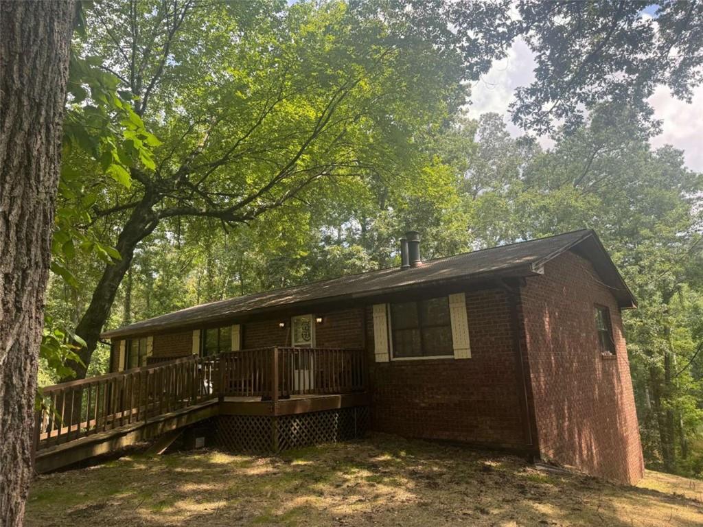 436 Kraftsman Road Southwest Rome, GA 30165 - Photo 1 of 1 a front view of a house with a yard