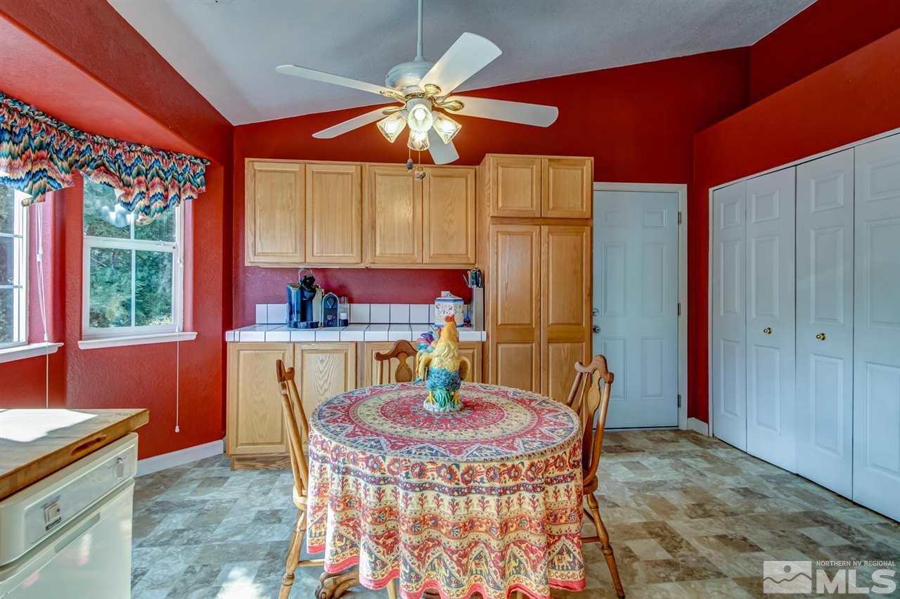 712 Talus Way Reno, NV 89503 - Photo 8 of 25 a dining room with a table and chairs